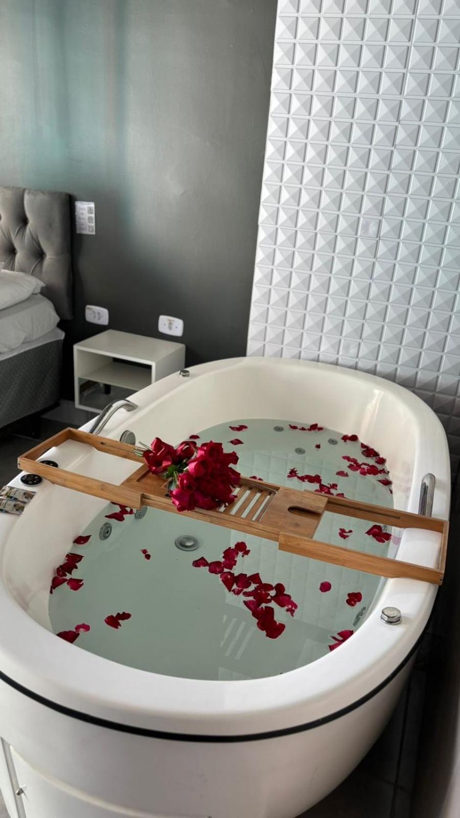 Hotel Encanto Sol E Mar 卡拉瓜塔图巴 客房 照片